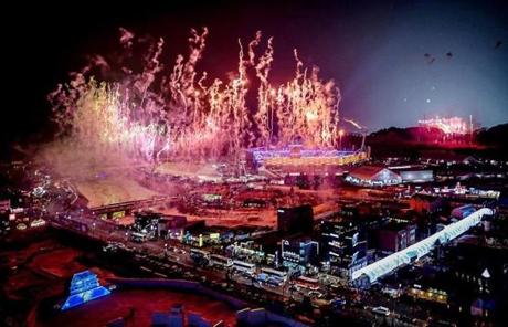 OPENING CEREMONY SLIDER1 Fireworks go off at the start of the opening ceremony of the Pyeongchang 2018 Winter Olympic Games at the Pyeongchang Stadium on February 9, 2018. / AFP PHOTO / Brendan SmialowskiBRENDAN SMIALOWSKI/AFP/Getty Images
