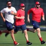 From left to right, Deven Marrero, Andrew Benintendi and Mitch Moreland sprinted around the bases at the Player Development Complex during baseball spring training on Tuesday.