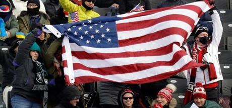 American Olympic fans cheered during a weather delay prior to the men's slopestyle qualifying on Saturday.
