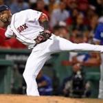 Boston, MA: August 31, 2017: Red Sox 3B Eduardo Nunez made a nice play on a slow roller off the bat of the Blue Jays Jose Bautista and he threw him out at first base in the top of the 8th inning.The Boston Red Sox hosted the Toronto Blue Jays in a regular season MLB baseball game at Fenway Park. (Jim Davis/Globe Staff). 