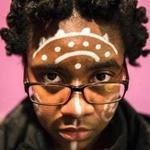 Boston, MA - 2/14/2018 - Dainika Balan,17, a student from Boston Arts Academy, wears face paint similar to characters from the Black Panther comic book series during a discussion of the significance of the upcoming release of the live action 