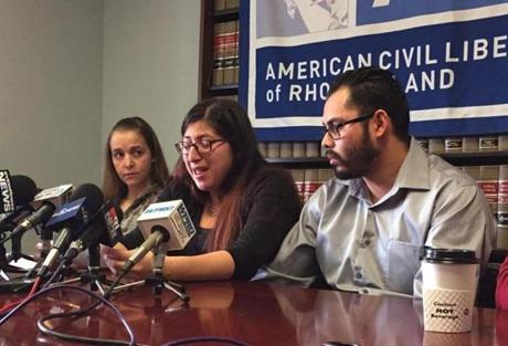Lilian Calderon spoke at a news conference in Rhode Island after she was detained by ICE as she attempted to apply for legal permanent residency. Luis Gordillo, her husband, is at right.
