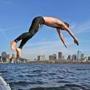 Trevor Long took a dive off the MIT sailing dock Wednesday.
