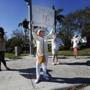 Teacher Cathy Kuhns demonstrated on a corner in Parkland, Fla.  