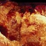 Three hand stencils found in Maltravieso Cave. One has been dated to at least 66,000 years ago and must have been made by a Neanderthal, researchers say.