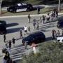 Students held their hands in the air as they were evacuated by police from Marjory Stoneman Douglas High School in Parkland, Fla.,after last week?s shooting that left 17 dead.