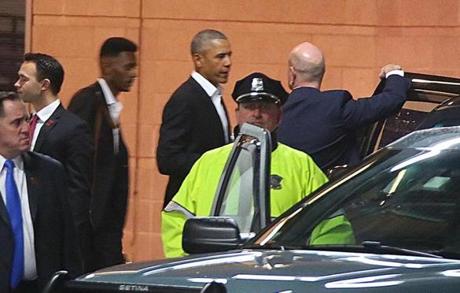 Former president Barack Obama left the the Boston Convention and Exhibition Center on Friday.
