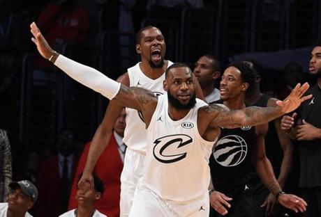 LOS ANGELES, CA - FEBRUARY 18: LeBron James #23 and Kevin Durant #35 (background) of Team LeBron react after a missed last second shot by DeMar DeRozan #10 of Team Stephen (right) during the NBA All-Star Game 2018 at Staples Center on February 18, 2018 in Los Angeles, California. Team LeBron won the game 148-145. (Photo by Kevork Djansezian/Getty Images)
