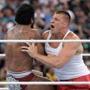IMAGE DISTRIBUTED FOR WWE - New England Patriots tight end Rob Gronkowski delivers a body tackle to WWE Superstar Jinder Mahal during a match at WrestleMania 33 on Sunday, April 2, 2017, in Orlando, Fla. (Phelan M. Ebenhack/AP Images for WWE)