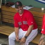Fort Myers, FL- 2/23/2018 - Red Sox Spring Training- Credit Stan Grossfeld/Boston Globe--- Red Sox manager Alex Cora enjoys a laugh prior to managing his first big league exhibition game.
