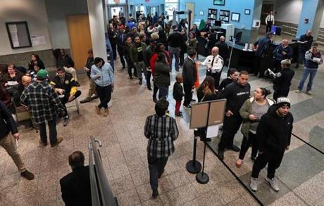 The lines were long as people waited to get into a night court session at the Providence Municipal Courthouse, many of whom were charged with speeding violations due to new traffic cameras in school zones.
