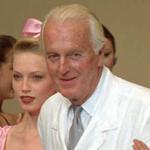French designer Hubert de Givenchy was applauded by his models after his 1995-96 fall-winter haute couture fashion collection presentation in 1995.  