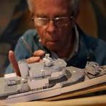 Ray Crean, a member of the USS Constitution Model Shipwright Guild, worked on a miniature of the Joseph P. Kennedy Jr.