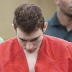 Nikolas Cruz is lead out of the courtroom after an arraignment hearing at the Broward County Courthouse in Fort Lauderdale, Fla., Wednesday, March 14, 2018. Cruz is accused of opening fire at Marjory Stoneman Douglas High School in Parkland, Fla., Feb. 14, killing 17 students and adults. (Amy Beth Bennett/, Pool)