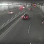 A cyclist was spotted pedaling through a portion of the Tip O'Neill Jr. Tunnel on Sunday.