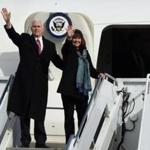 Vice President Mike Pence and his wife Karen waved upon their departure at Yokota Air Base at Fussa near Tokyo.