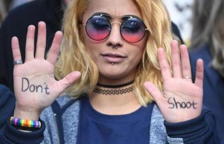 A demonstrator penned a message on her hands in Washington, D.C. 
