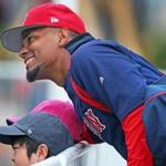 Fort Myers, FL 2/21/2018: The Red Sox Xander Bogaerts poses for a photo with some youngsters. It was the final day of workouts at Spring Training for the Red Sox today at the Player Development Complex at Jet Blue Park. The team begins exhibition games with a doubleheader vs college teams tomorrow. (Jim Davis/Globe Staff)