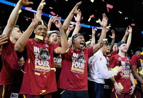 ATLANTA, GA - MARCH 24: The Loyola Ramblers celebrate after defeating the Kansas State Wildcats during the 2018 NCAA Men's Basketball Tournament South Regional at Philips Arena on March 24, 2018 in Atlanta, Georgia. Loyola defeated Kansas State 78-62 to advance to the Final Four. (Photo by Kevin C. Cox/Getty Images)
