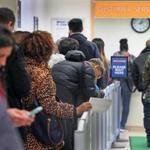 People arrived at the Registry of Motor Vehicles office on Blackstone Street in Boston were informed that their estimated wait time would be four hours.