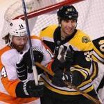 Boston-03/08/18- The Boston Bruins vs the Philadelphia Flyers- Bruins Zdeno Chara works to clear Flyers Sean Couturier from the front of the Bruins net in the 3rd period. John Tlumacki/Globe Staff(sports)