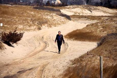 Dennis- 03/27/18- George MacDonald, the Chairman of the Dennis Conservation Commission walks along the four-wheel drive access road to the Crowes Pasture flats and beach. He wants off-road vehicles be able to drive on the flats. Photo by John Tlumacki/Globe Staff(metro)
