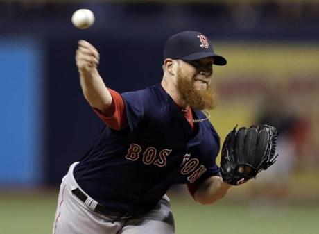 Boston Red Sox relief pitcher Craig Kimbrel delivers to the Tampa Bay Rays during the ninth inning of a baseball game Friday, March 30, 2018, in St. Petersburg, Fla. The Red Sox won the game 1-0. (AP Photo/Chris O'Meara)
