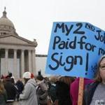 Thousands of teachers, including Melissa Knight of Ardmore, Okla., protested Monday at the Oklahoma state Capitol.