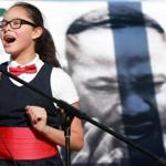 Boston MA 4/2/18 Ailyn Aguasbivas, 9, with the James J. Chittick Elementary School All Star Choir singing a solo during the readings of MLK's last speech before he was assassinated at City Hall Plaza. (photo by Matthew J. Lee/Globe staff) topic: 03mlk reporter: 
