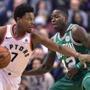 Toronto Raptors guard Kyle Lowry (7) drives on Boston Celtics guard Terry Rozier (12) during the first half of an NBA basketball game Wednesday, April 4, 2018, in Toronto. (Frank Gunn/The Canadian Press via AP)