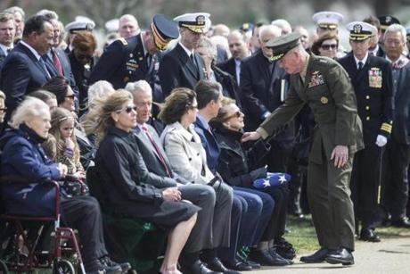 Chairman of the Joint Chiefs of Staff Gen. Joseph Dunford speaks to Georgea Hudner, during burial services for her husband, Medal of Honor Recipient Navy Capt. Thomas J. Hudner, a naval aviator from Concord, Mass., April 4, 2018 in Arlington, Virginia. Capt. Hudner earned the Medal of Honor for his actions in the Battle of the Chosin River during the Korean War. Capt. Hudner earned the Medal of Honor for his actions in the Battle of the Chosin River during the Korean War. (Zach Gibson for The Boston Globe)
