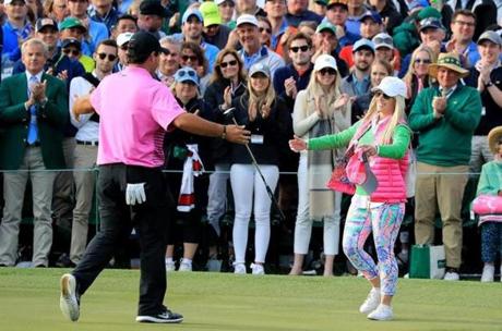 Patrick Reed celebrated with his wife Justine Karain Reed after he won The Masters golf tournament on Sunday.

