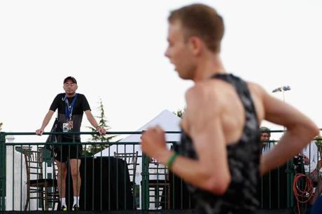 Nike Oregon Project coach Alberto Salazar (left) watched as Galen Rupp compete in the Men's 10,000 meter run during day one of the 2015 USA Outdoor Track & Field Championships at Hayward Field in 2015.
