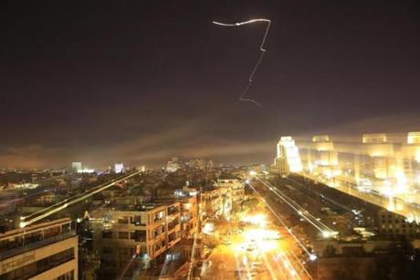 Damascus was rocked by loud explosions Friday night that lit up the sky.
