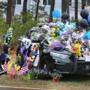 Two young boys left flowers and paused to say a prayer at slain Yarmouth police Officer Sean Gannon?s cruiser Friday.