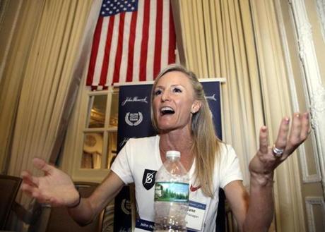 Elite U.S. runner Shalane Flanagan speaks to reporters, Friday, April 13, 2018, in Boston. The 122nd running of the Boston Marathon is scheduled for Monday. (AP Photo/Elise Amendola)
