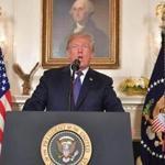 TOPSHOT - US President Donald Trump addresses the nation on the situation in Syria April 13, 2018 at the White House in Washington, DC. Trump said strikes on Syria are under way. / AFP PHOTO / Mandel NGANMANDEL NGAN/AFP/Getty Images