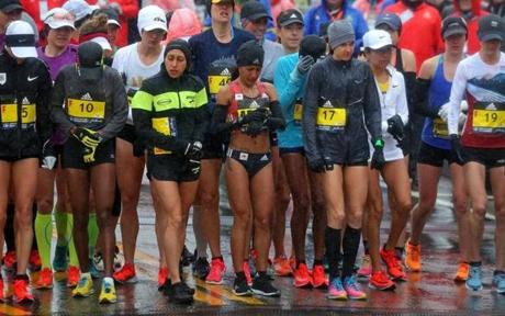 MARATHON SLIDER HOPKINTON, MA - 4/16/2018: Boston Marathon Start.....womens elite starting line with cold legs (David L Ryan/Globe Staff ) SECTION: SPORTS TOPIC Boston Marathon
