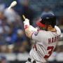 Washington Nationals' Bryce Harper hits a solo home run in the first inning of a baseball game against the New York Mets, Monday, April 16, 2018, in New York. (AP Photo/Kathy Willens)