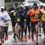 Natick, MA - 4/16/2018 - elite men's runners run through the rain along the route of the Boston Marathon in Natick, MA, Apr. 16, 2018. (Keith Bedford/Globe Staff) 