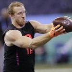 South Carolina tight end Hayden Hurst runs a drill at the NFL football scouting combine, Saturday, March 3, 2018, in Indianapolis. (AP Photo/Darron Cummings)