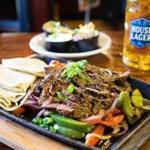 Get two-for-one fajitas at Olde Magoun?s Saloon on Saturday.