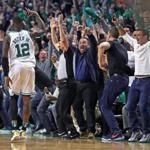 Boston, MA: 4/15/18: The Celtics Terry Rozier III, (12) made the crowd come out of their seats after he hit a three pointer with .5 seconds left in the fourth quarter to give Boston a 99-96 lead. The Boston Celtics hosted the Milwaukee Bucks in Game One of an Eastern Conference First Round NBA Playoff basketball game at the TD Garden. (Jim Davis/Globe Staff)