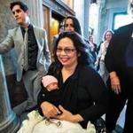 Democratic Senator from Illinois Tammy Duckworth carries her 10-day old daughter Maile Pearl Bowlsbey onto the Senate floor to cast her vote. It is the first time in Senate history that a baby has been allowed on the Senate floor for a vote.