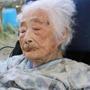 This Sept. 2015 photo shows Nabi Tajima, the world's oldest person, a 117-year-old Japanese woman. Tajima died of old age, at 117, in a hospital Saturday evening, April 21, 2018, in the town of Kikai in southern Japan, town official Susumu Yoshiyuki confirmed. She had been hospitalized since January. (Kikai Town/Kyodo News via AP)