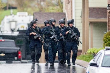 Mandatory Credit: Photo by RICK MUSACCHIO/EPA-EFE/REX/Shutterstock (9639460b) Metro Nashville Police used a SWAT team and bomb squad to serve a search warrant at the apartment of the suspected gunman who opened fire with an assault rifle officials at a Waffle House Restaurant in Nashville, Tennessee, USA, 22 April 2018. The gunman killed four and injured several others before a patron in the restaurant wrestled his weapon away from him.The gunman escaped and remains on the loose. Search for suspect in shooting at Waffle House in Tennessee, Nashville, USA - 22 Apr 2018
