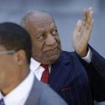 Bill Cosby acknowledged supporters Friday as he left a Norristown, Pa., courthouse.