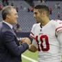 HOUSTON, TX - DECEMBER 10: Jimmy Garoppolo #10 of the San Francisco 49ers celebrates with general manager John Lynch after the game against the Houston Texans at NRG Stadium on December 10, 2017 in Houston, Texas. (Photo by Tim Warner/Getty Images)