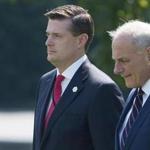 (FILES) White House Chief of Staff John Kelly (R) and White House Staff Secretary Rob Porter (L)walk to Marine One prior to departure from the South Lawn of the White House in Washington, DC, August 4, 2017. White House Chief of Staff John Kelly has ordered changes to the way staff gain access to America's most closely guarded secrets, after a top aide worked for months without full clearance. Kelly, a former Marine Corps general, proposed a series of tweaks intended to limit temporary security clearances, but which also seemed designed to draw a line under the Rob Porter scandal.The aide -- who had daily access to the Oval Office and handled top secret documents -- resigned in disgrace this month after allegations he beat both his former wives. / AFP PHOTO / SAUL LOEBSAUL LOEB/AFP/Getty Images
