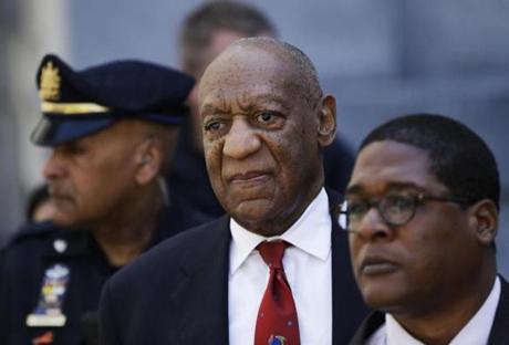 Bill Cosby, center, leaves the the Montgomery County Courthouse after being convicted of drugging and molesting a woman, Thursday, April 26, 2018, in Norristown, Pa. (AP Photo/Matt Slocum)
